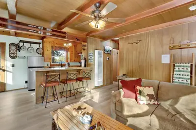 a living room with a couch and a table at Kozy cabin #2386 in Big Bear Lake