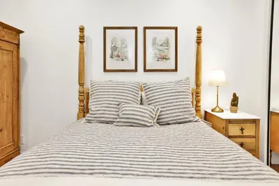 a bedroom with a bed with two pillows at Pine meadow village castle #2301 in Big Bear Lake