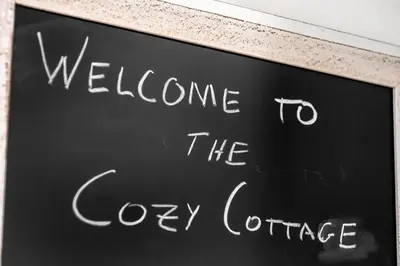 a chalkboard sign with welcome to the grey conference at Cozy Cottage, Brand New, fully Private, walk to Everything in Thousand Oaks