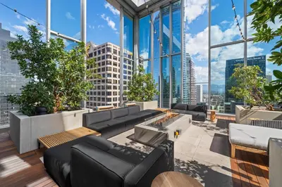 a living room with a view of a city at Brand New Modern & Luxury Residence in DTLA in Los Angeles