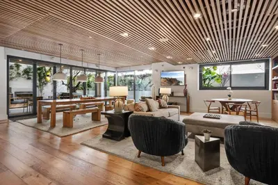 a living room with a couch and a table at Versatile Luxury Oasis in Los Angeles