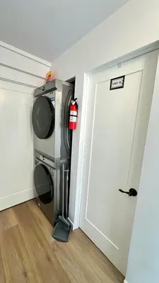 a door leading into a room with a microwave at Modern 2BR Stylish & Cozy Unit in Los Angeles
