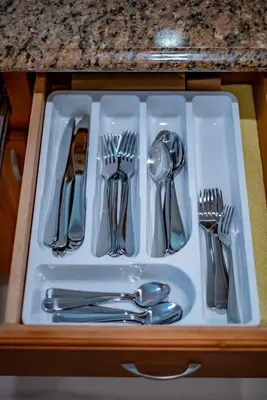 a tray with silver utensils in a drawer at Peaceful Family Home with 3 Bedrooms and 2 Bathrooms in Glendora