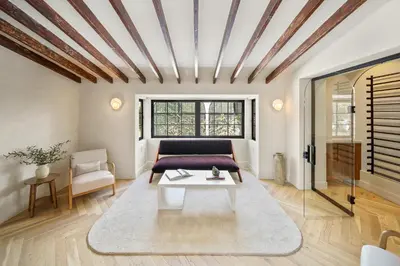 a living room with a couch and a table at Bella Villa in Los Angeles
