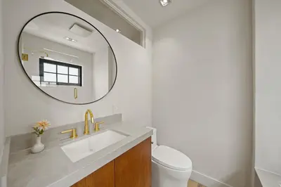 a bathroom with a sink and a mirror at Bella Villa in Los Angeles