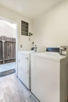 a kitchen with a white counter and a dishwasher at Modern 2BR Condo with King Bed & Balcony near LA in Alhambra