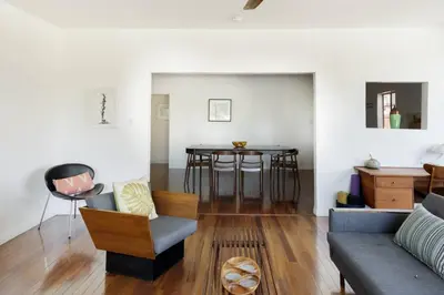 a living room with a couch and a table at Silver Lake Mid-century Nestled in the Treetops in Los Angeles