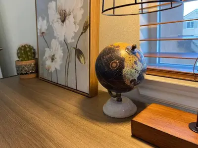 a vase sitting on a table next to a window at Bella's sweet house 5608 in Eastvale