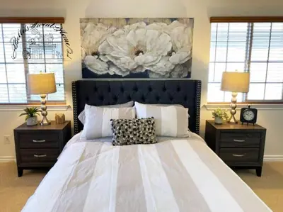 a bedroom with a large bed with two night stands at Bella's sweet house 5608 in Eastvale