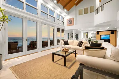 a living room with a view of the ocean at Coastal Serenity in Malibu