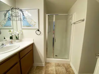 a bathroom with a shower and a sink at Bella's sweet house 5640 in Eastvale