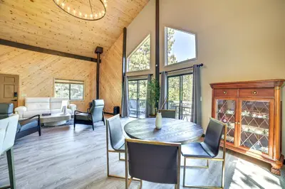 a dining room with a table and chairs at Pine Mountain Club Cabin with AandC and EV Charger in Pine Mountain Club