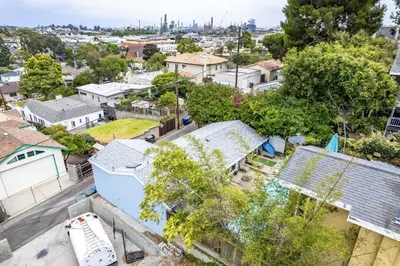 an aerial view of a city with houses at NEW BEACH Pool Home, New Industrial OCEAN Vibe, Hot Tub, Pool, Views in El Segundo