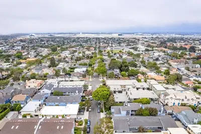 an aerial view of a town with houses at NEW BEACH Pool Home, New Industrial OCEAN Vibe, Hot Tub, Pool, Views in El Segundo