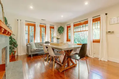 a dining room with a table and chairs at Cozy 3 Bedroom Hollywood Home- Quick Walk To All Tourist Spots! in Los Angeles