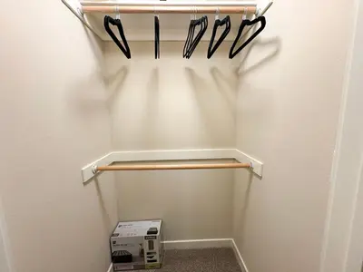 a room with a closet with a rack with knives at Stylish 1 Bedroom Apartment in LA with Free Parking - 10 Minutes away from Ceders Sinai in Los Angeles