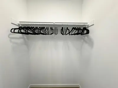 a towel rack in a white wall with a black rack at Modern Hollywood Home Sunset View & Free Parking - 10mins to Universal Studios in Los Angeles