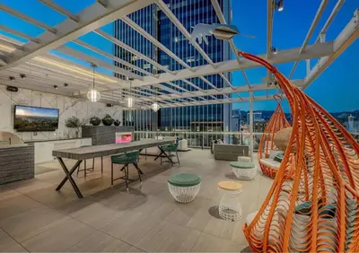 a large room with a table and chairs at Modern Hollywood Home Sunset View & Free Parking - 10mins to Universal Studios in Los Angeles