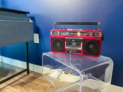 a red radio sitting on top of a table at Cozy Home in LA - Free Parking 10 Min to Cedars in Los Angeles