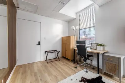 an office with a desk and a chair and a window at Quiet King bed Westward Room in heart of Pasadena in Pasadena