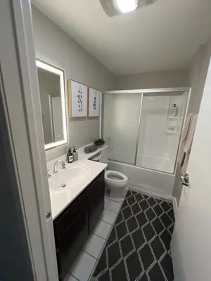 a bathroom with a sink and a toilet and a shower at Shared House Hollywood Hideaway Heart of Fame in Los Angeles