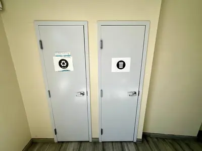 two white doors in a room next to each other at FuLLy LoAdeD ReSerVaTioN 3bed 2ba w Parking in Los Angeles