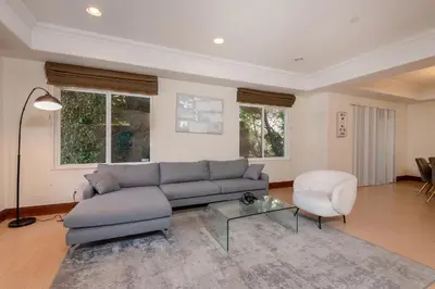 a living room with a couch and a chair at Luxurious Apt Your Private Gem in LA in Los Angeles