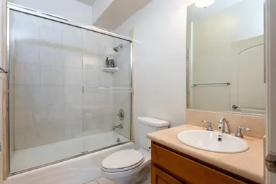 a bathroom with a shower and a toilet and a sink at Luxurious Apt Your Private Gem in LA in Los Angeles