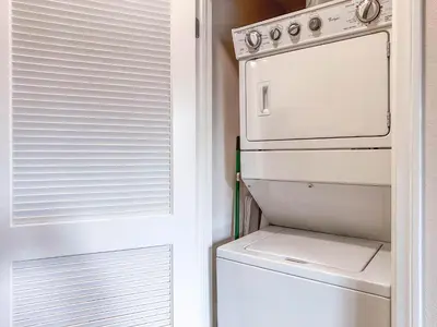 a kitchen with a refrigerator and a washer and dryer at Monthier LACMA WI4S4U0 in Los Angeles