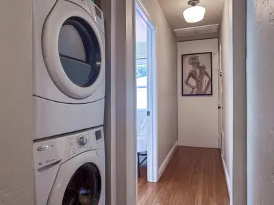 a laundry room with a washer and dryer at Monthier Picfair Village CA1H6O23 in Los Angeles