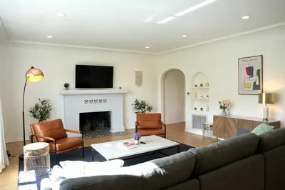 a living room with a couch and a fireplace at Monthier The Grove OA7T4H55 in Los Angeles