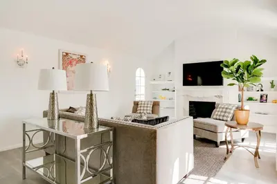 a living room with a couch and a fireplace at Monthier Melrose PO7H2O0 in Los Angeles