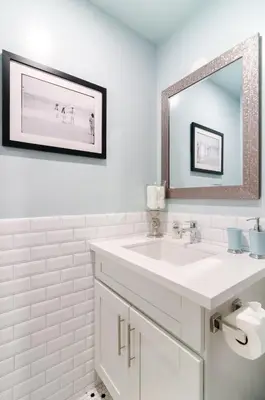 a white bathroom with a sink and a mirror at Sunny 1 Bedroom in the Heart of Venice Beach - 2 in Los Angeles