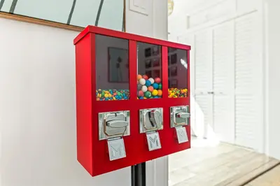 a red box with balls in it on a wall at Los Angeles charming big house, king bed, parking, EV in Los Angeles