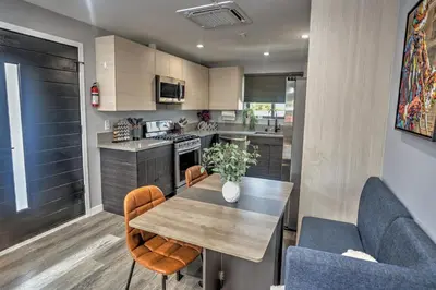 a kitchen with a table and two chairs and a kitchen sidx sidx sidx at Corner Haus Los Angeles in Los Angeles
