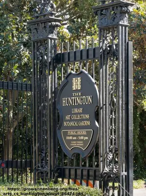 a sign on the gate of a black iron fence at Elegant Exclusive Escape In Downtown Los Angeles in Alhambra