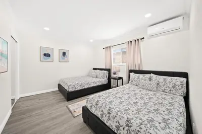 a bedroom with a bed and a couch in it at Idyllic Paradise Near Downtown Los Angeles in Alhambra