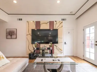 a living room with a couch and a flat screen tv at Elegant Living Private Room in Modern Home 9 in Los Angeles
