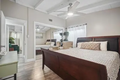 a bedroom with a bed and a living room at The Perfect Vacation Spot Near Six Flags Magic Mountain in Santa Clarita