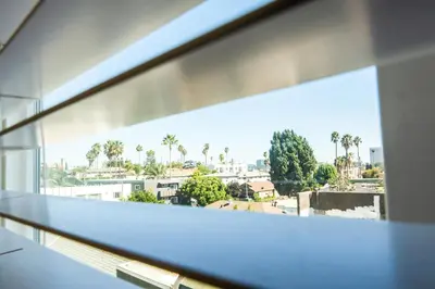 a view of a city from an office window at Modern 3 Bedroom 3 Level Loft in Hollywood Sleeps 10 Free Gated Parking Full Kitchen in Los Angeles