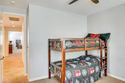 a bedroom with a bunk bed in a room at Rio Bravo Country Club Home in Bakersfield with Pool in Bakersfield