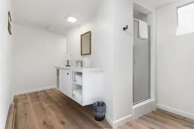 a bathroom with a sink and a mirror at Mountain Nook CN Lodge #4 in Ponderosa