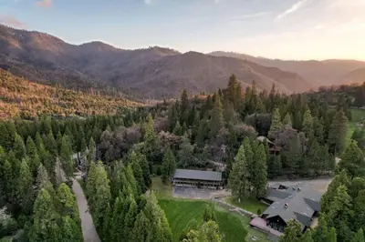an aerial view of a house in a forest at Sierra Vista @CN Lodge #8 in Ponderosa