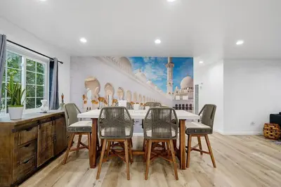 a dining room with a table and four chairs at Casa Lanzit - 35 Percent Off All March! in Los Angeles