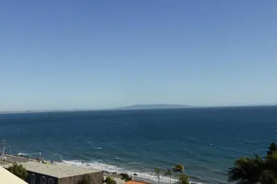 a view of the beach and ocean from a building at OCEAN PARADISE SANTA MONICA ADJACENT 2 Bedroom in Malibu