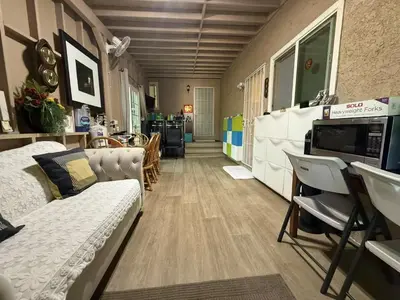 a living room with a couch and a table at Alhambra\u7cbe\u54c1\u5957\u623f\u72ec\u7acb\u536b\u6d74 in Alhambra
