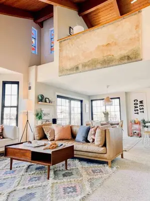 a living room with a couch and a coffee table at Cool Cali Vibe - Barefoot Stepping Distance 2 Sand in Oxnard