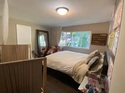 a bedroom with a bed and a window at Luxe in Hollywood Hills- modern oasis, pool 5 min to Sunset in Los Angeles