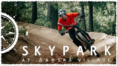 a man riding a bike on a dirt trail at Lake Arrowhead Charming Chalet in Lake Arrowhead