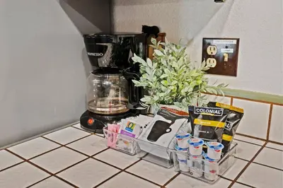 a counter top with a coffee maker and a blender at Big Bear Lake Sleep 16 in Big Bear Lake